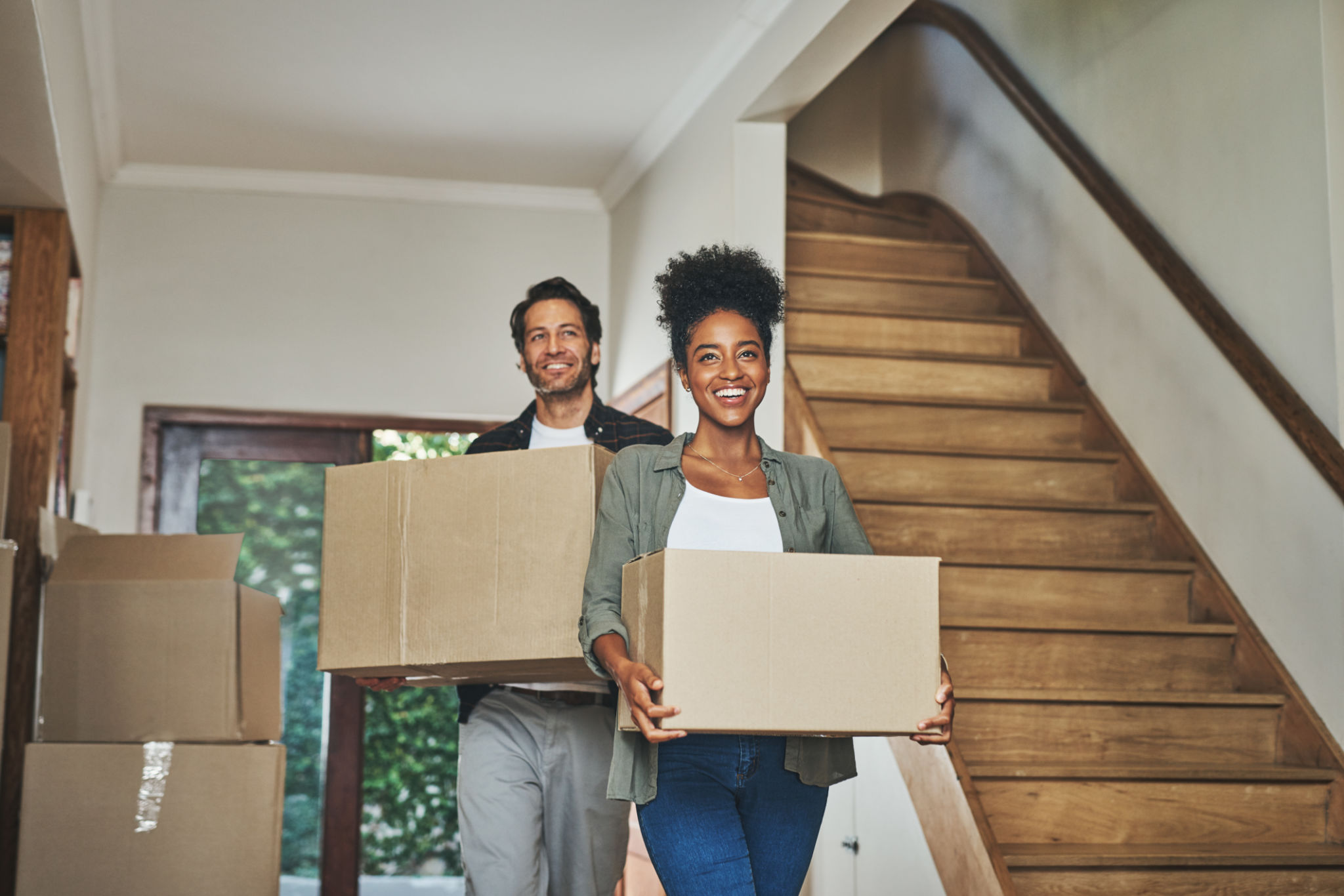Family moving into new home with mortgage from Arbor Financial Group